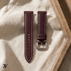 Burgundy Ostrich Leather Watch Strap — styled scene