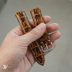 Burnt Amber Patina Alligator Leather Watch Strap — shown on watch