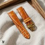 Cognac Patina Alligator Strap with Butterfly Buckle — styled scene