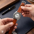 Cognac Patina Cowhide Leather Watch Strap — shown on watch