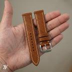 Cognac Waxed Cowhide Leather Watch Strap — shown on watch