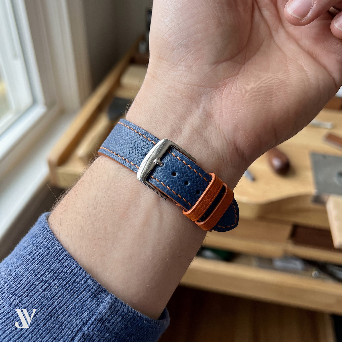 Navy Blue Orange Epsom Classic Leather Watch Strap — shown on watch (AI-generated scene)