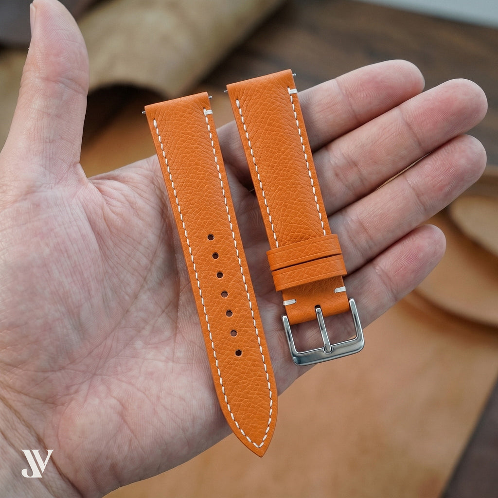 Orange Epsom Classic Leather Watch Strap — shown on watch (AI-generated scene)