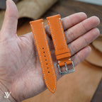 Orange Epsom Classic Leather Watch Strap — shown on watch (AI-generated scene)