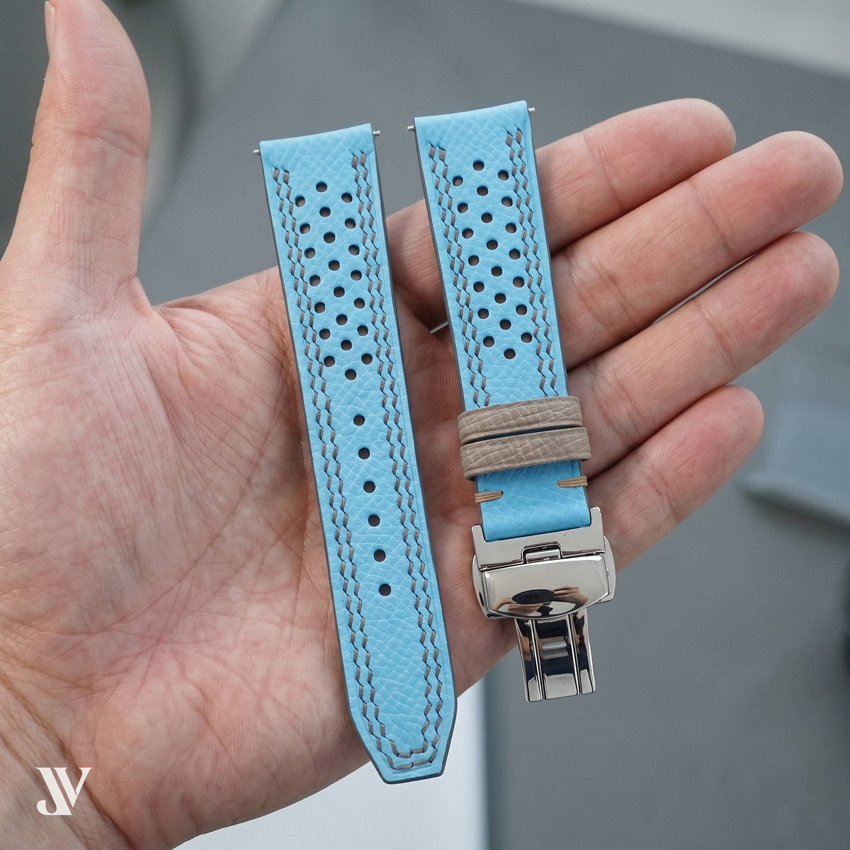 Sky Blue Gray Epsom Rally Leather Watch Strap — shown on watch (AI-generated scene)