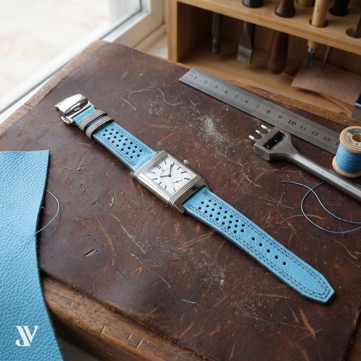 Sky Blue Gray Epsom Rally Leather Watch Strap — shown on watch (AI-generated scene)