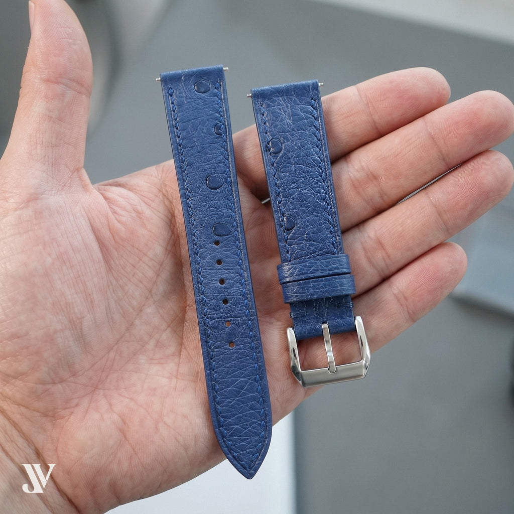 Denim Blue Ostrich Leather Watch Strap — shown on watch (AI-generated scene)