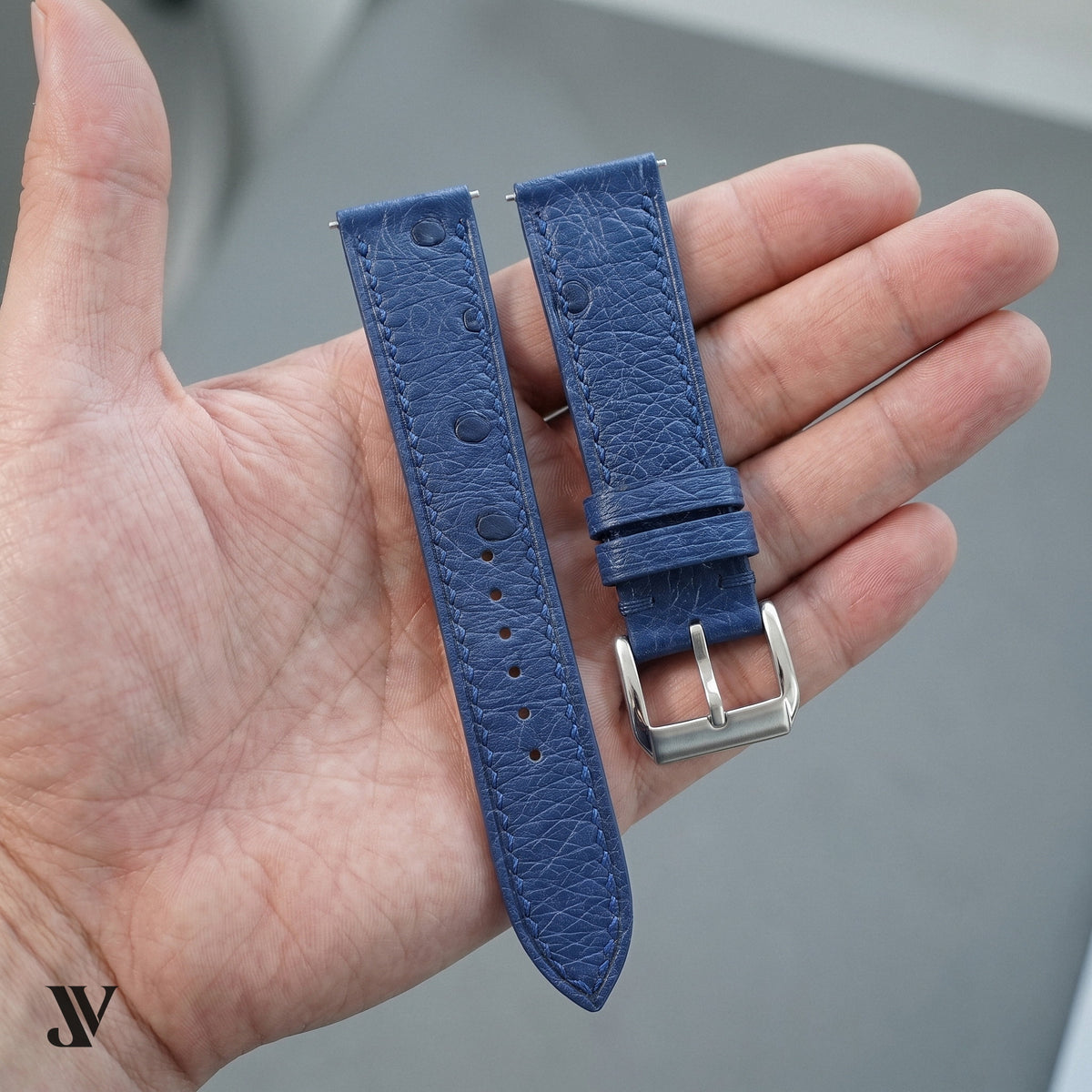Denim Blue Ostrich Leather Watch Strap — shown on watch (AI-generated scene)