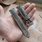 Olive Grey Ostrich Leg Leather Watch Strap — shown on watch (AI-generated scene)